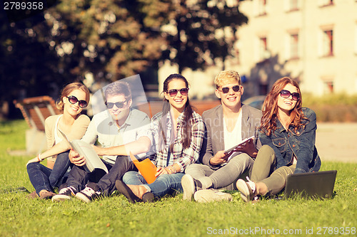 Image of students or teenagers with laptop computers