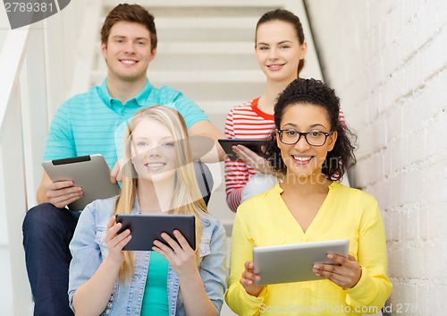 Image of smiling students with tablet pc computer