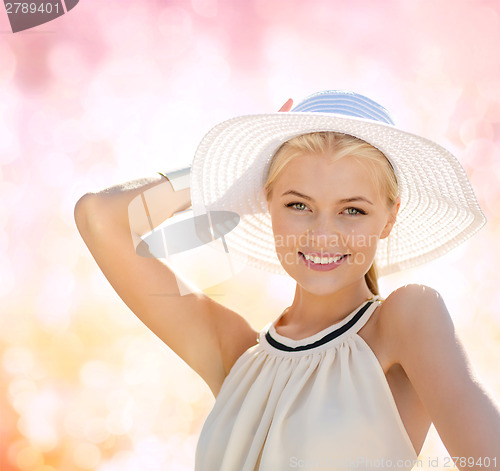 Image of beautiful woman enjoying summer outdoors