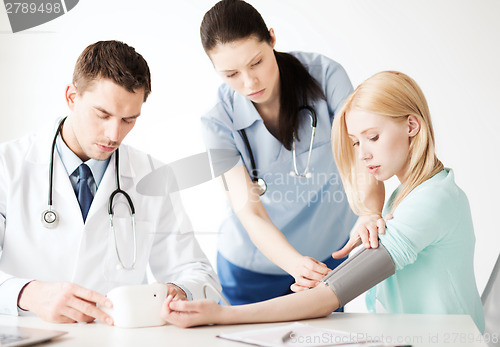 Image of doctor and patient in hospital