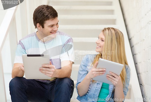 Image of smiling students with tablet pc computer