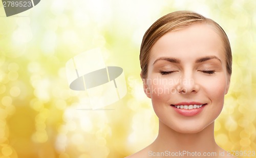 Image of face of beautiful woman with closed eyes