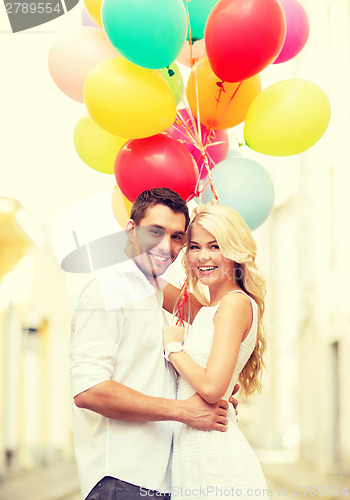 Image of couple with colorful balloons