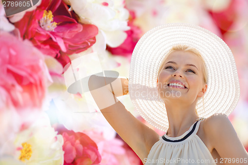 Image of beautiful woman enjoying summer outdoors