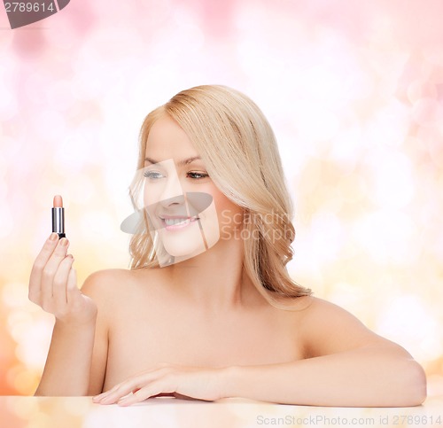 Image of beautiful woman with pink lipstick