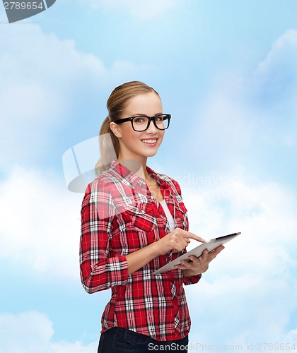 Image of smiling girl in eyeglasses with tablet pc computer