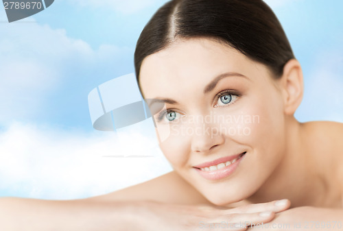 Image of smiling woman in spa salon