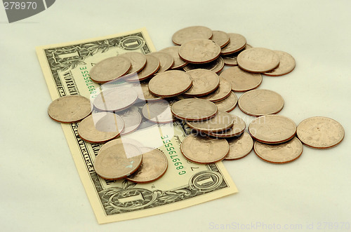 Image of quarters and a dollar note