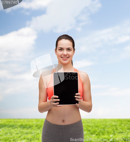 Image of sporty woman with tablet pc blank screen