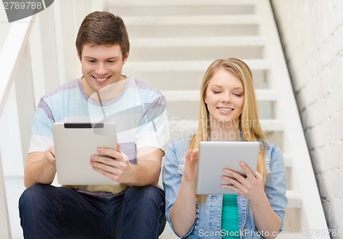 Image of smiling students with tablet pc computer