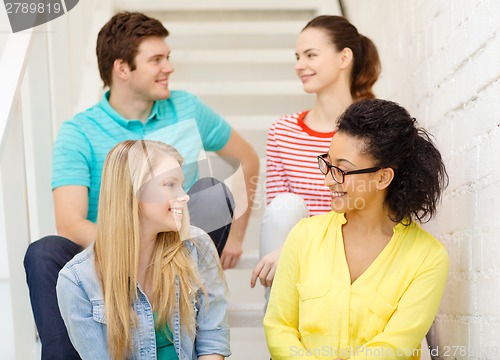 Image of smiling teenagers hanging out