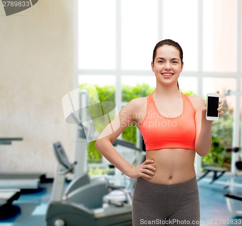 Image of sporty woman with smartphone