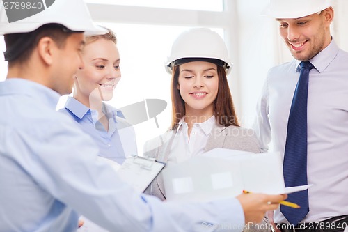 Image of happy business team in office