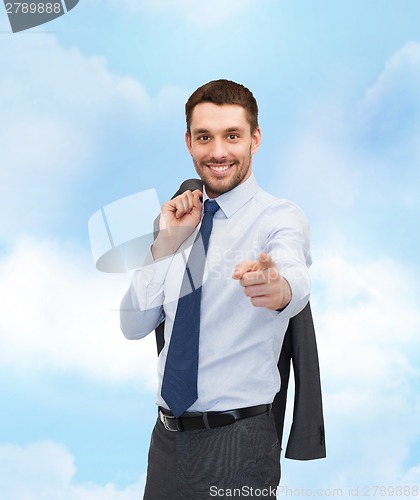 Image of handsome buisnessman with jacket over shoulder