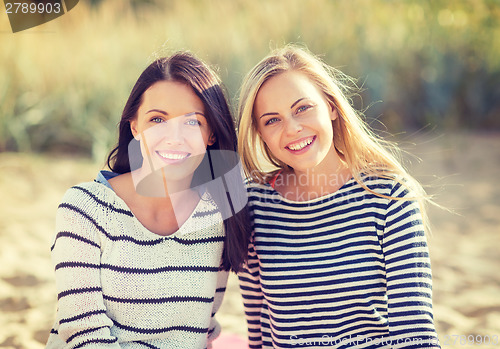 Image of beautiful teenage girls or young women having fun