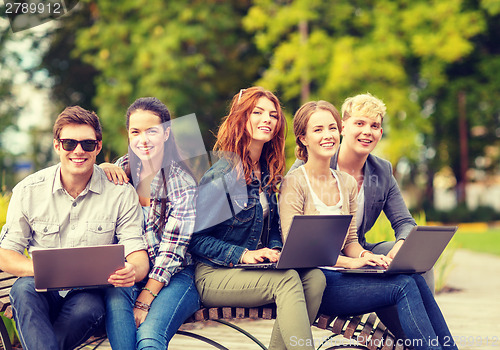 Image of group of students or teenagers hanging out