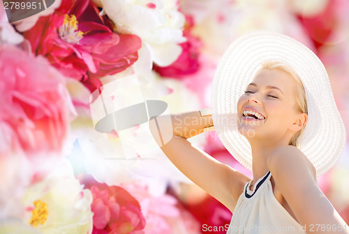 Image of beautiful woman enjoying summer outdoors