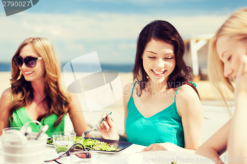 Image of girls in cafe on the beach