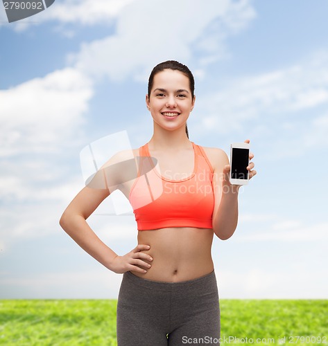 Image of sporty woman with smartphone