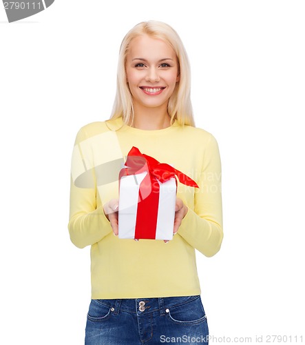 Image of smiling girl with gift box