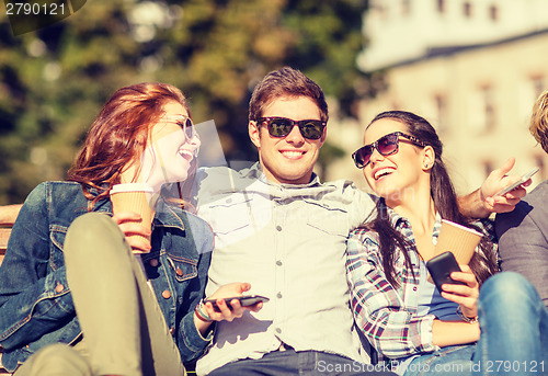 Image of group of students or teenagers with smartphones