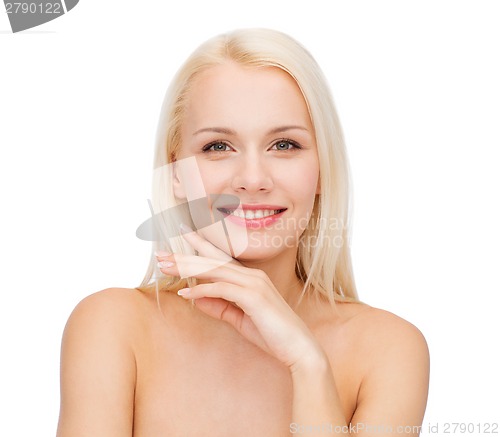 Image of face and hands of beautiful woman