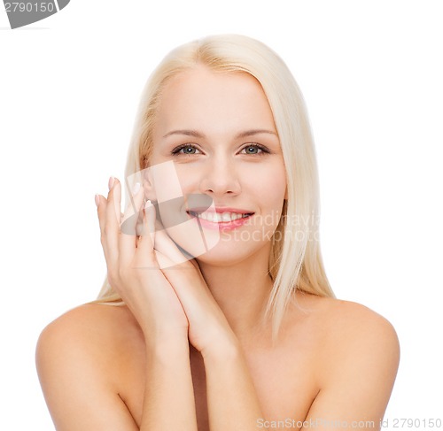 Image of face and hands of happy woman