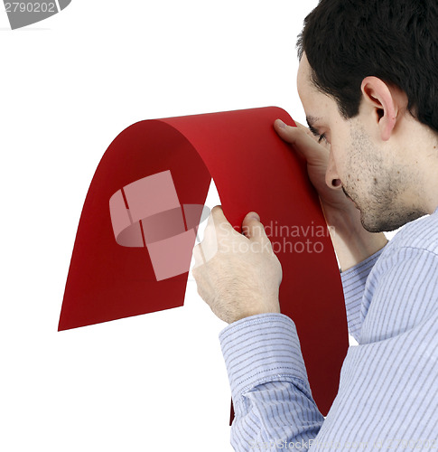Image of Man holding a paper
