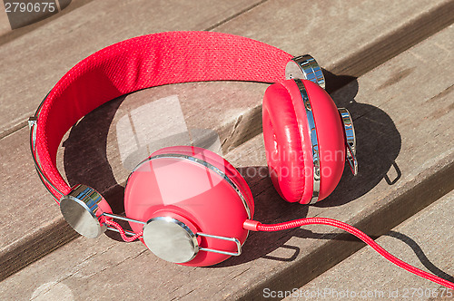 Image of Bright red wired headphones