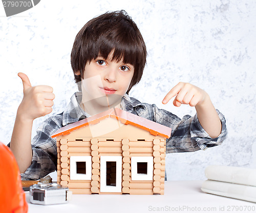 Image of boy built a new house