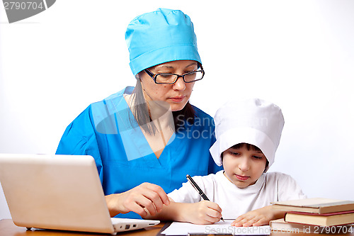 Image of mom and son doctors