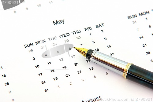 Image of Calendar and pen