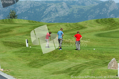 Image of three golfers