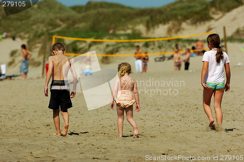 Image of three kids on beach