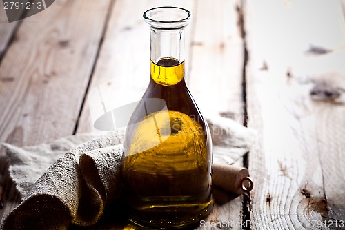 Image of fresh olive oil in bottle 