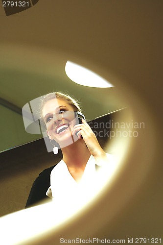 Image of businesswoman talking on mobile phone