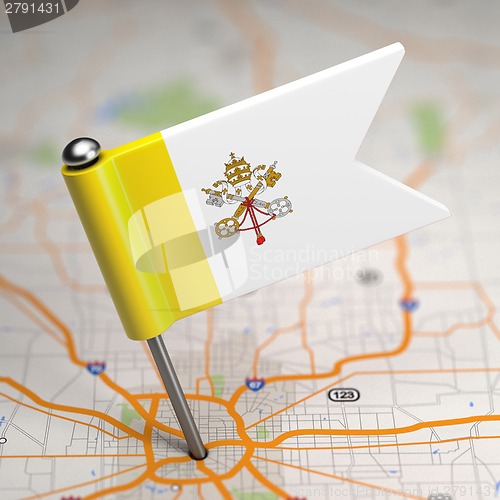 Image of Vatican City Small Flag on a Map Background.