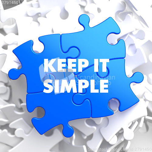 Image of Keep It Simple Concept on Blue Puzzle.