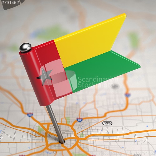 Image of Guinea-Bissau Small Flag on a Map Background.