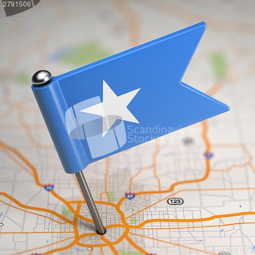 Image of Somalia Small Flag on a Map Background.