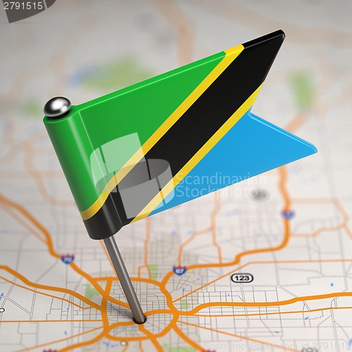 Image of Tanzania Small Flag on a Map Background.