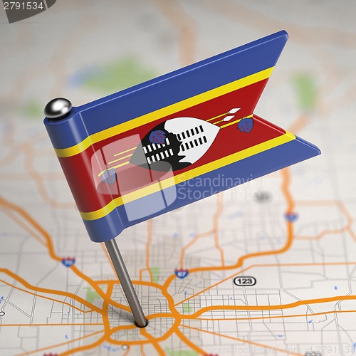 Image of Swaziland Small Flag on a Map Background.