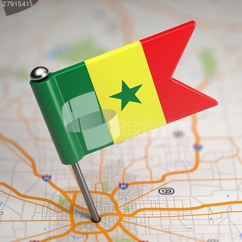 Image of Senegal Flag on a Map Background.