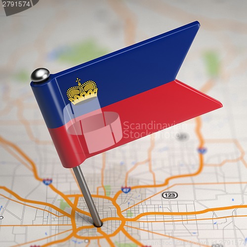 Image of Liechtenstein Small Flag on a Map Background.