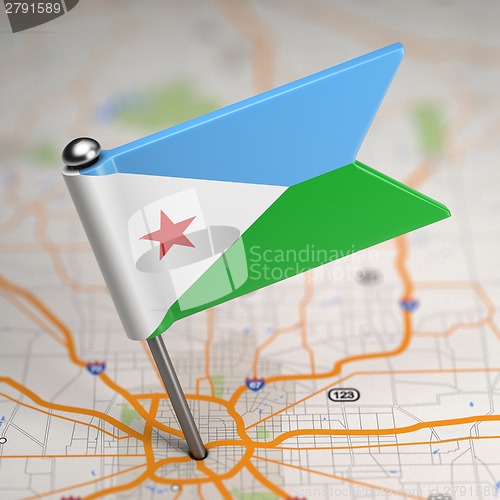 Image of Djibouti Small Flag on a Map Background.