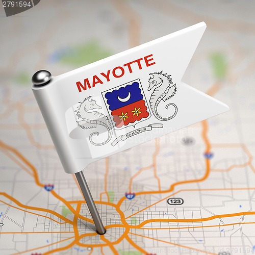 Image of Mayotte Small Flag on a Map Background.