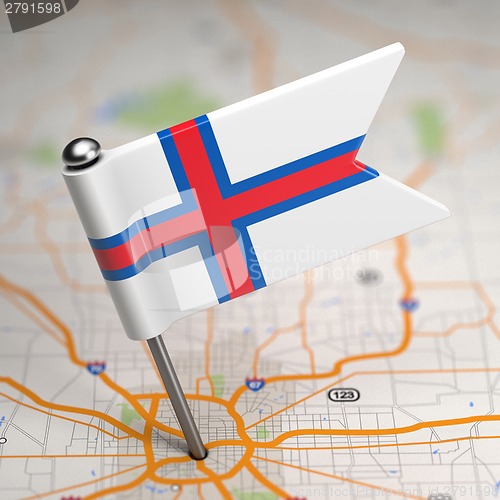 Image of Faroe Islands Small Flag on a Map Background.