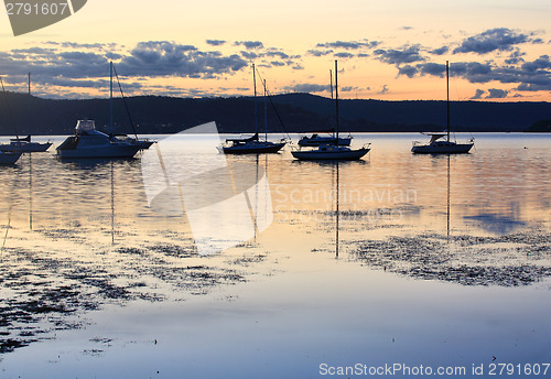 Image of Boats moored at dusk