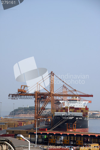 Image of ship loading at cargo port