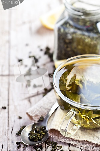 Image of cup of green tea and lemon 